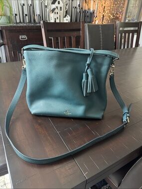 kate spade teal pebble leather tassel crossbody